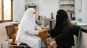 nurse providing patient care at mobile health clinic rural KPK Pakistan 2026. nurse jobs in Lakki Marwat KP 2026