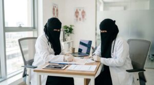 PAF female doctor consulting patient at PAF hospital .PAF female Medical Officer jobs 2026Pakistan 2026